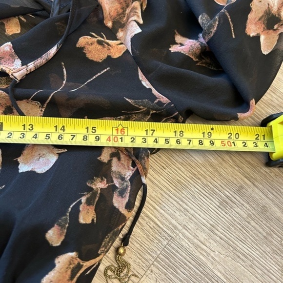 Pretty floral dress. Sheer with tank liner. Tassel details. Elastic waistband. - Picture 9 of 13